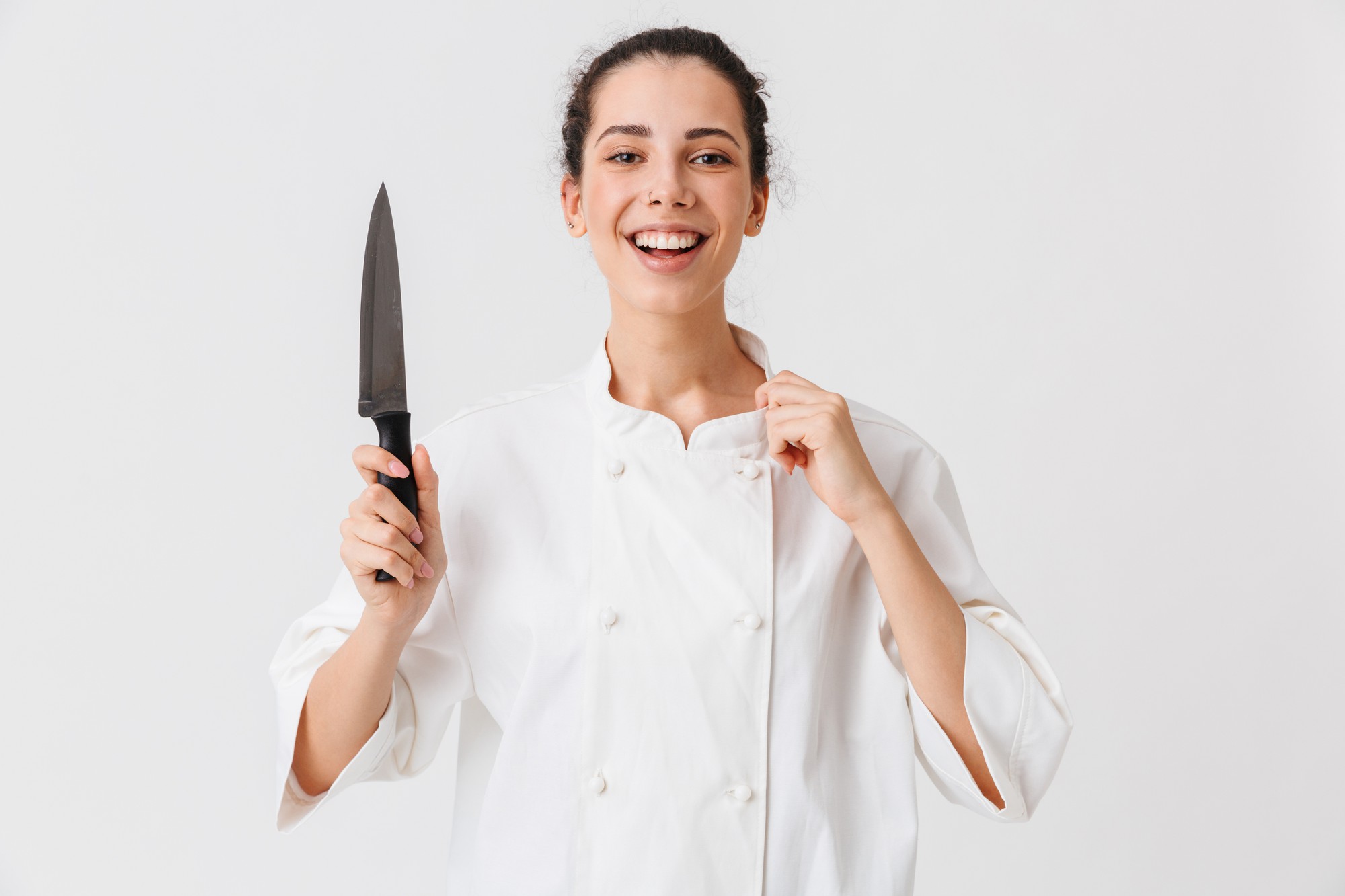 Insegnante che mostra tecnica di cucina